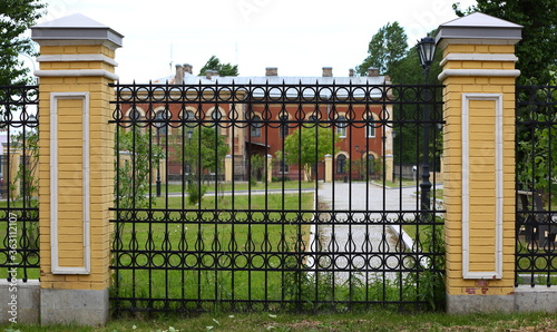 Black metal lattice fence, Oktyabrskaya embankment 18, Saint Petersburg, Russia, July 2020 photo