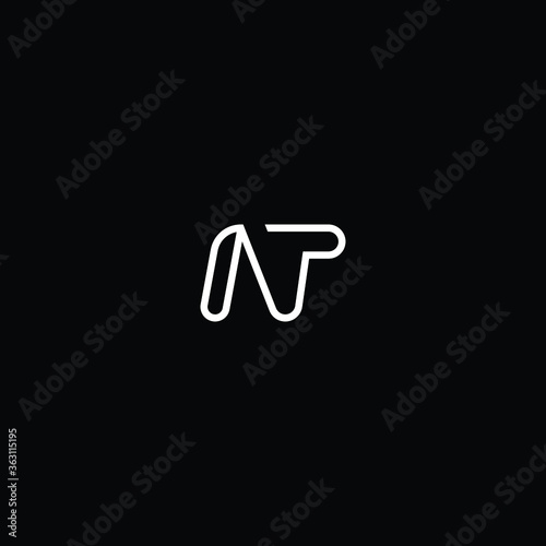 Minimal elegant monogram art logo. Outstanding professional trendy awesome artistic NT TN initial based Alphabet icon logo. Premium Business logo white color on black background