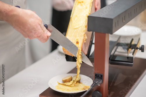 Swiss Raclette. Warm Melted Swiss Cheese