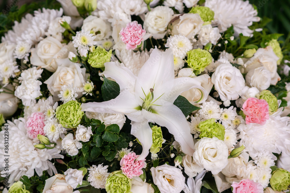 The harmony of white and blue flowers in flower basket The harmony of white and blue flowers in flower basket