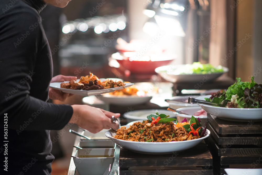 several food on buffet line catering