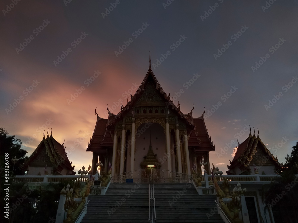 view evening of Buddhist temple with twilight sky background, Wat Don Toom, Ban Pong, Ratchaburi, Thailand.