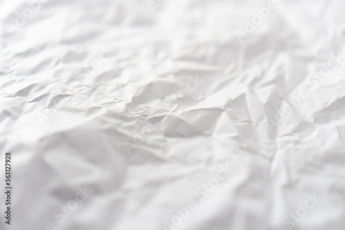 Top view of white crumpled paper background.