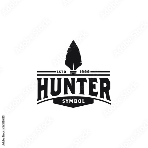 Retro Rustic Arrowhead.  creative vintage Hipster Spear Hunting Logo Design