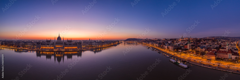 Panoramic aerial shot of Danube Hugnarian Parliament and Buda hill at dawn before Budapest sunrise