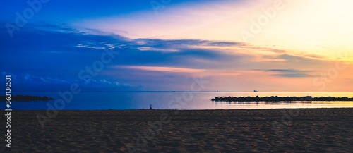 sunset over the river Chesapeake bay sunrise moon set night time day time same time