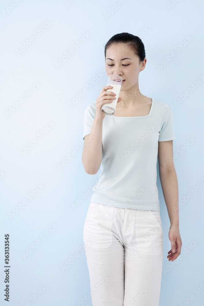 Woman drinking milk Woman drinking milk
