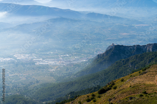 Sunrise views from the Montcabrer mountain with Cocentaina castle at right, Cocentaina.