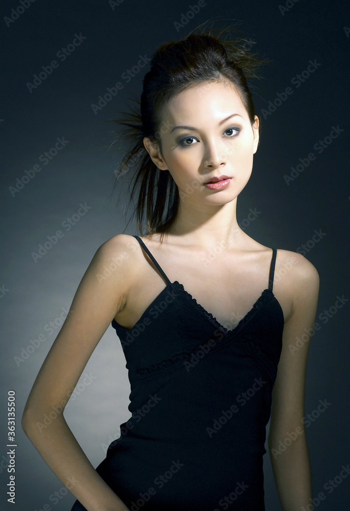 Studio shot of a lady in black dress Studio shot of a lady in black dress