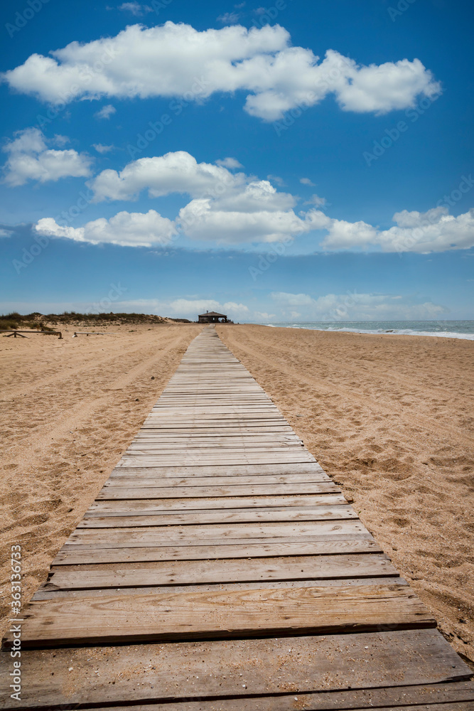 Wooden Path To Gurugu Beach Bar In Spain