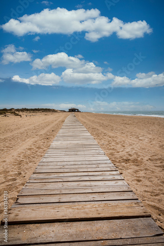 Wooden Path To Gurugu Beach Bar In Spain