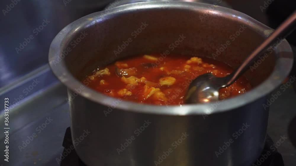 Malaysian tasty street food. Curry sauce and chili sauce with spicy ingredients. Malaysian tasty street food. Curry sauce and chili sauce with spicy ingredients.