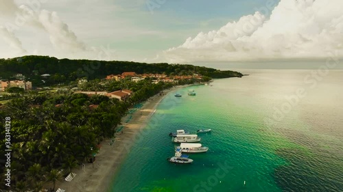 An early morning aerial view of a tranquil West Bay turquoise beach in Roatan, Honduras. photo