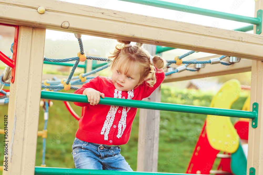 Fototapeta premium children play on the slide