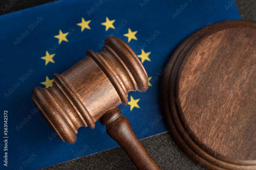 Judge gavel over European Union flag. Training jurisprudence in Europe. Legality concept