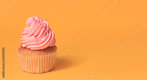 Pink cupcakes on a yellow background