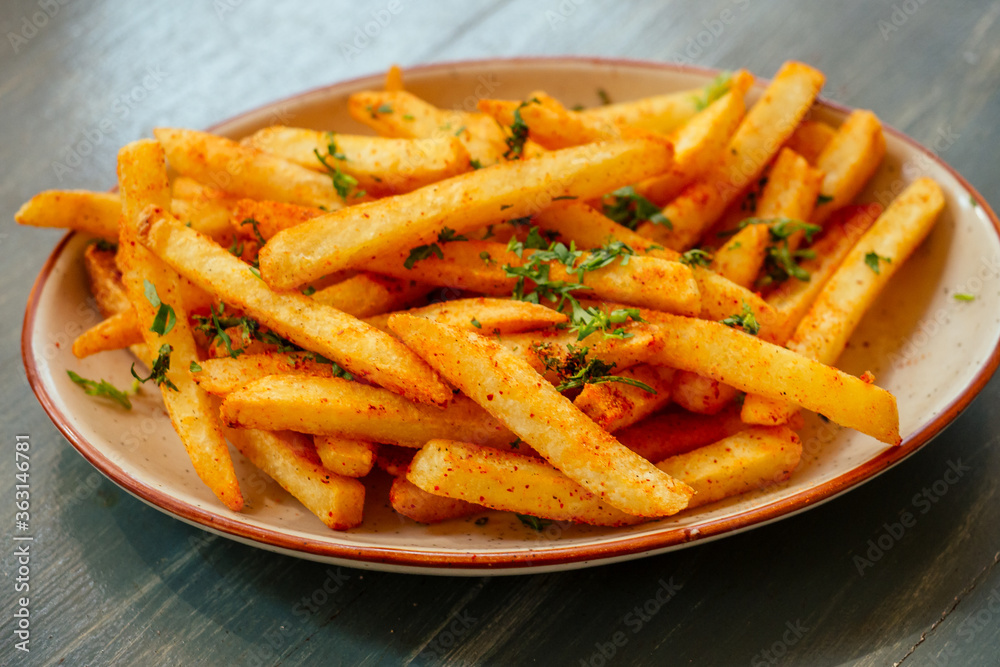 fry potato with red pepper on plate spicy asian food fry potato with red pepper on plate spicy asian food