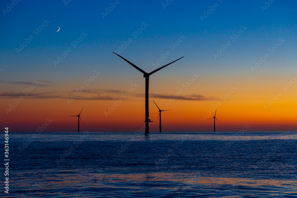 Beautiful sunset at the North Sea offshore wind farm