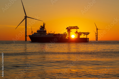 Beautiful sunset at the North Sea offshore wind farm