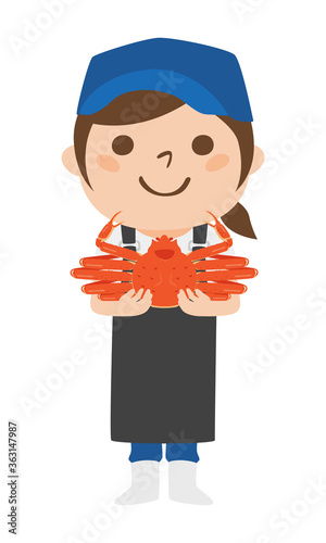 笑顔でズワイガニを持った女性の魚屋さんのイラスト。