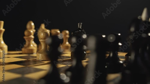 Wallpaper Mural last piece in a game of chess against an imposing opponent, representing great challenges and motivational strategy Torontodigital.ca