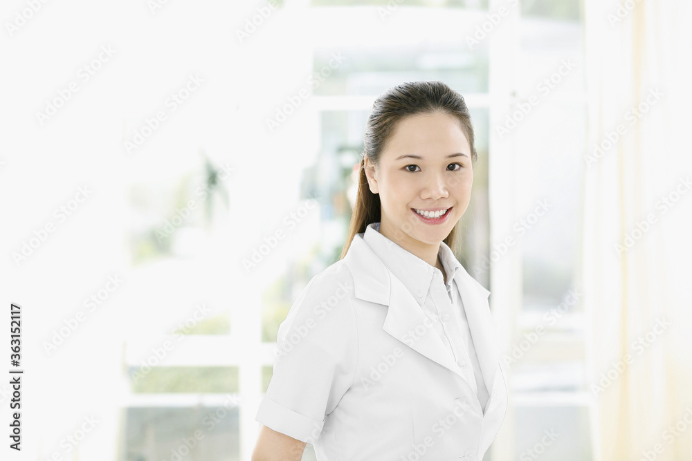 Female doctor smiling at the camera