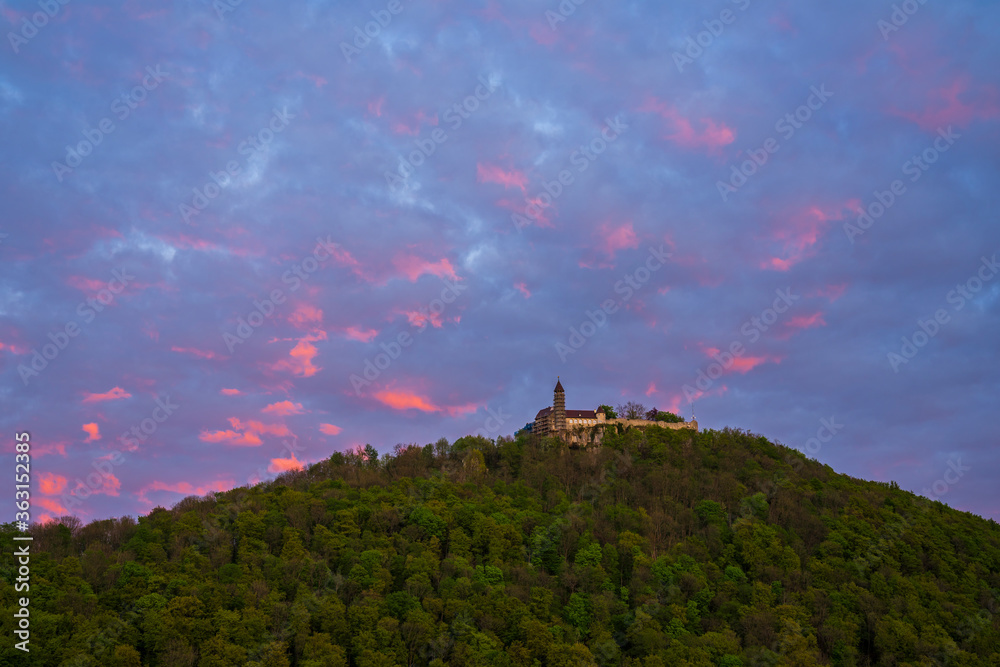 Obraz premium Germany, Scenic view up to ancient castle teck in swabian alb or swabian jura landscape in romantic orange sunset light