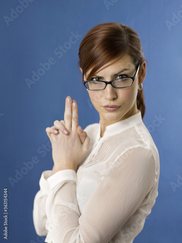 Woman wearing glasses posing