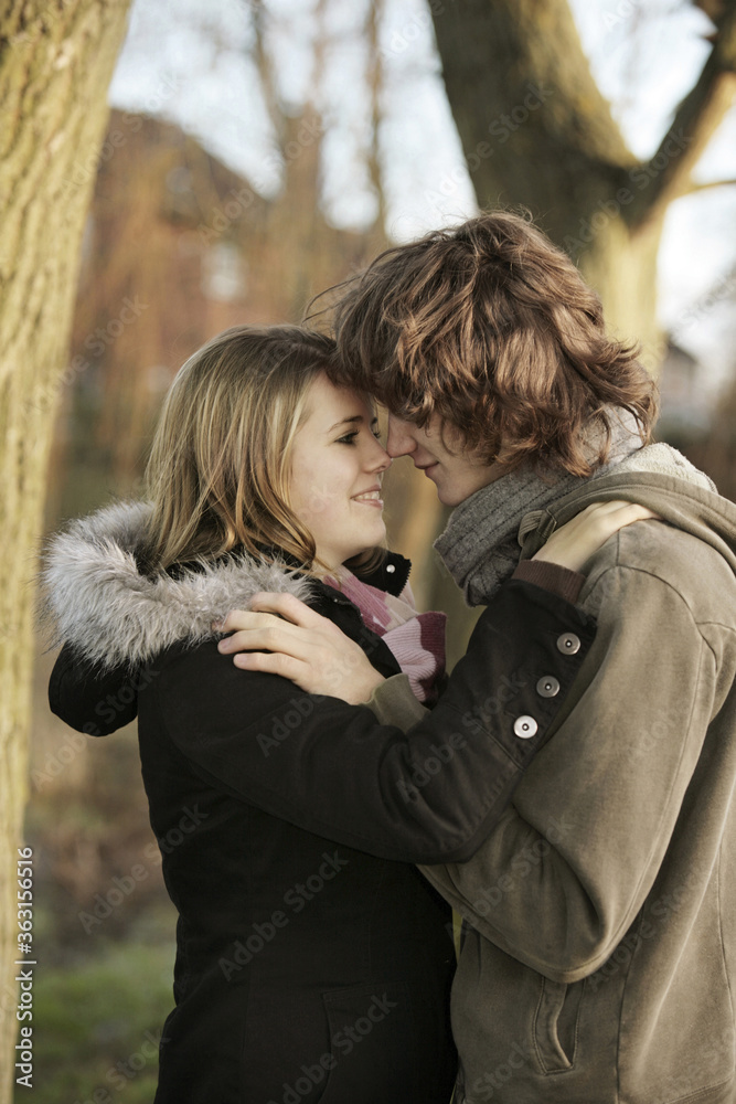 Fototapeta premium Couple facing each other, nose to nose