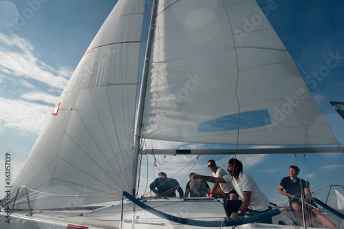 Luxury yachts at Sailing regatta. Sailing in the wind through the waves at the Sea. 