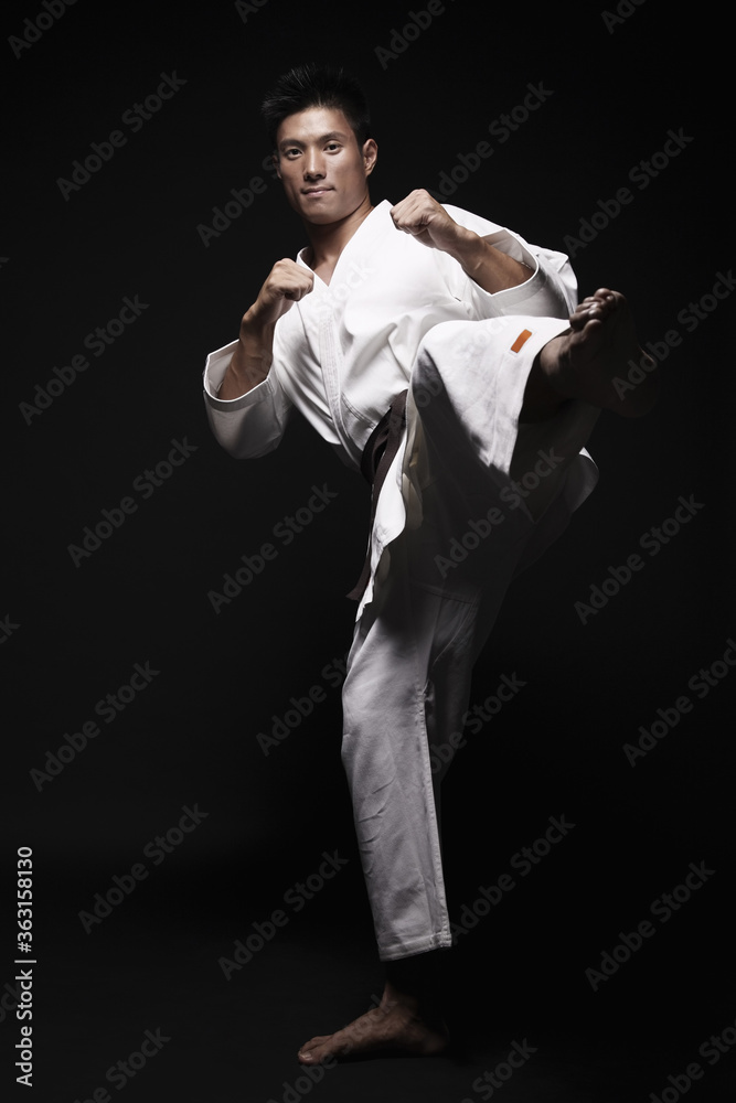 Man performing karate move