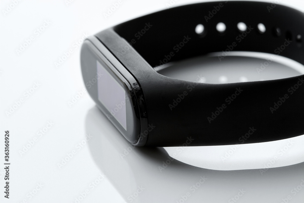 Black fitness watch or activity tracker on white background. Black fitness watch or activity tracker on white background.