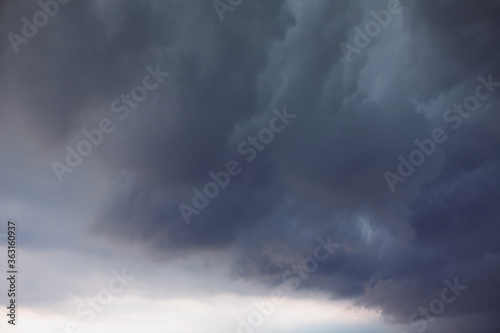 Altostratus clouds spread over the sky . Stormy cloudscape