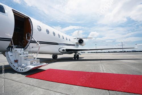 Private airplane with red carpet