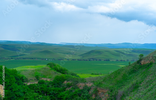 Mountain valley stretching over the horizon