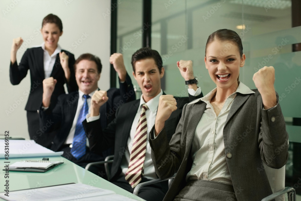 Business people celebrating their success Business people celebrating their success
