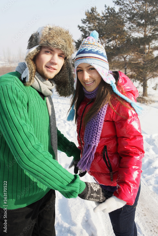 Man and woman holding hands