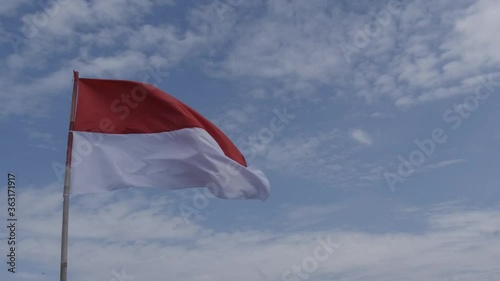 Indonesia Flag Fluttering in Sky. Indonesia Independence Day in August.