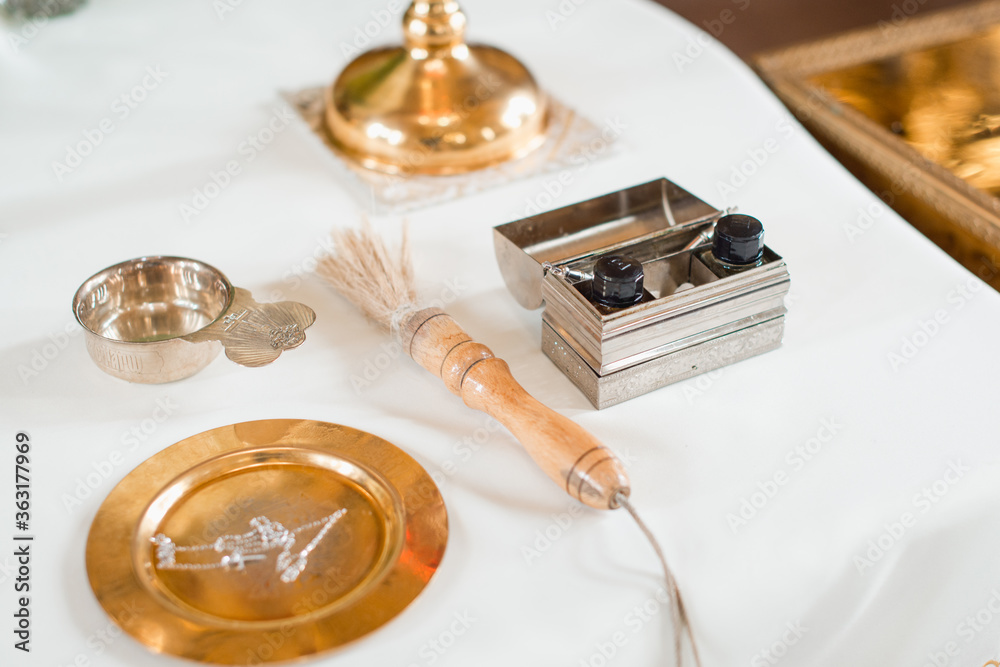 Set of priest for conducting the baptism ceremony in the Church Set of priest for conducting the baptism ceremony in the Church