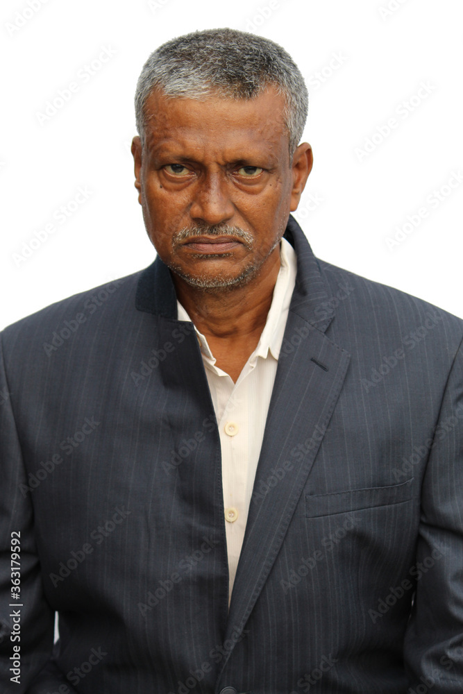Senior Indian man cropped portrait view with angry or sad expression on white background. Senior Indian man cropped portrait view with angry or sad expression on white background.