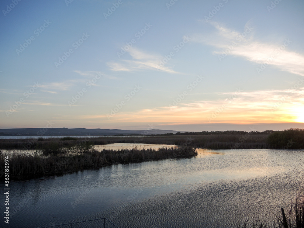 Breathtaking sunset in Danube Delta,  Romania,  in a summer day
