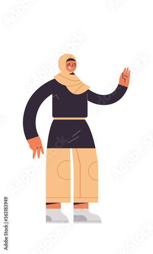 arabic woman in traditional clothes arab businesswoman pointing hand at something female cartoon character standing pose full length isolated vertical vector illustration