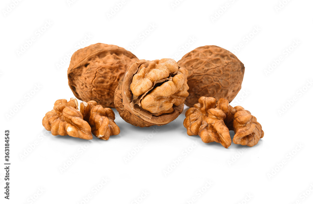 Whole walnuts and walnut kernels on white background Whole walnuts and walnut kernels on white background