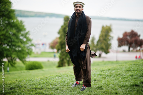 Pakistani pathan man wear traditional clothes. photo