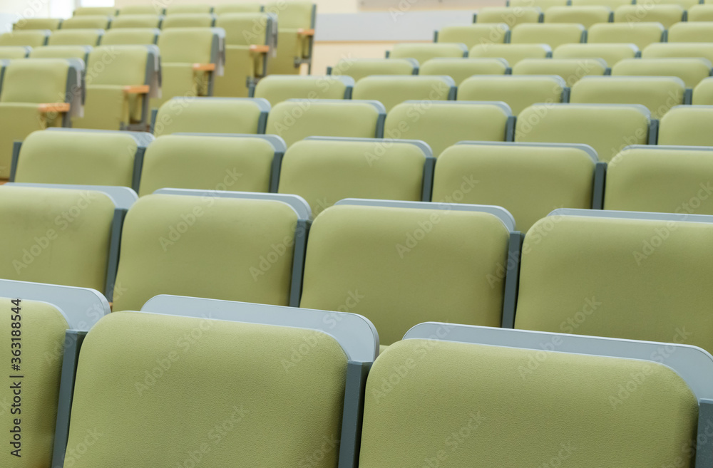 Fototapeta premium Lecture hall. Empty chairs.