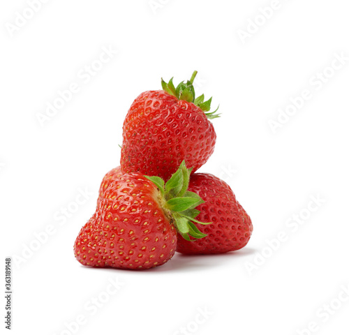 whole ripe red strawberries isolated on a white background