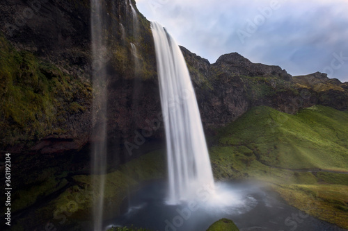 The impressive Seljalandsfoss waterfall photographed from the side 