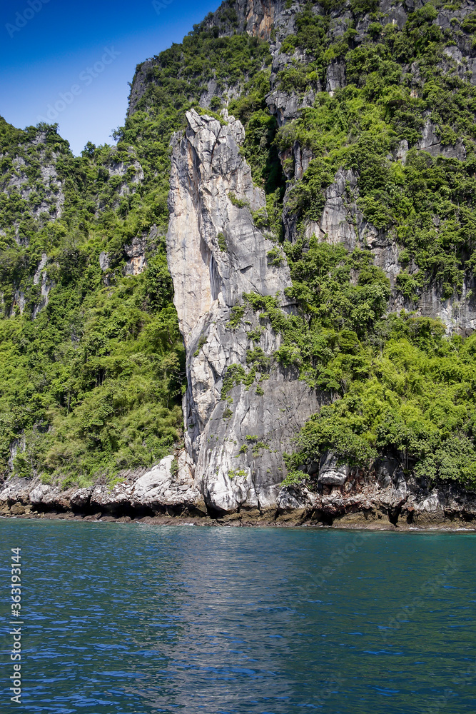 Eroded overgrown limestone rocks in Phang Nga Bay, Ao Phang Nga Marine National Park, Thailand,