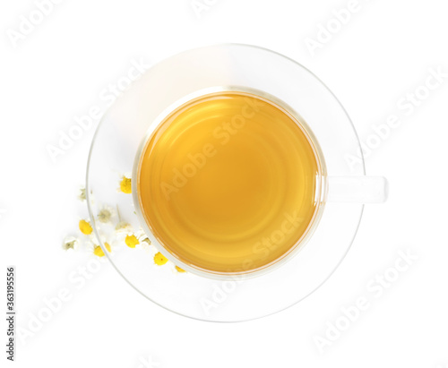 Fresh chamomile tea and dry flowers isolated on white, top view