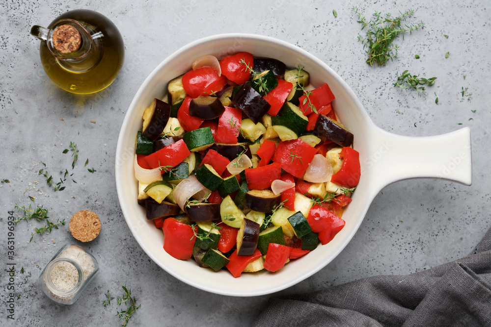 Stewed vegetables in ceramic pan. Ratatouille traditional french cuisine Stewed vegetables in ceramic pan. Ratatouille traditional french cuisine